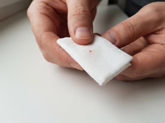 Blot the first drop — The first drop goes on the gauze and gets thrown away.